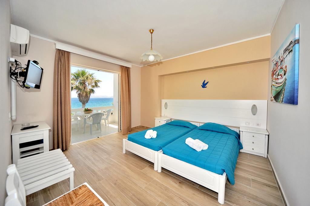 Byron Apartments Тигаки Номер фото