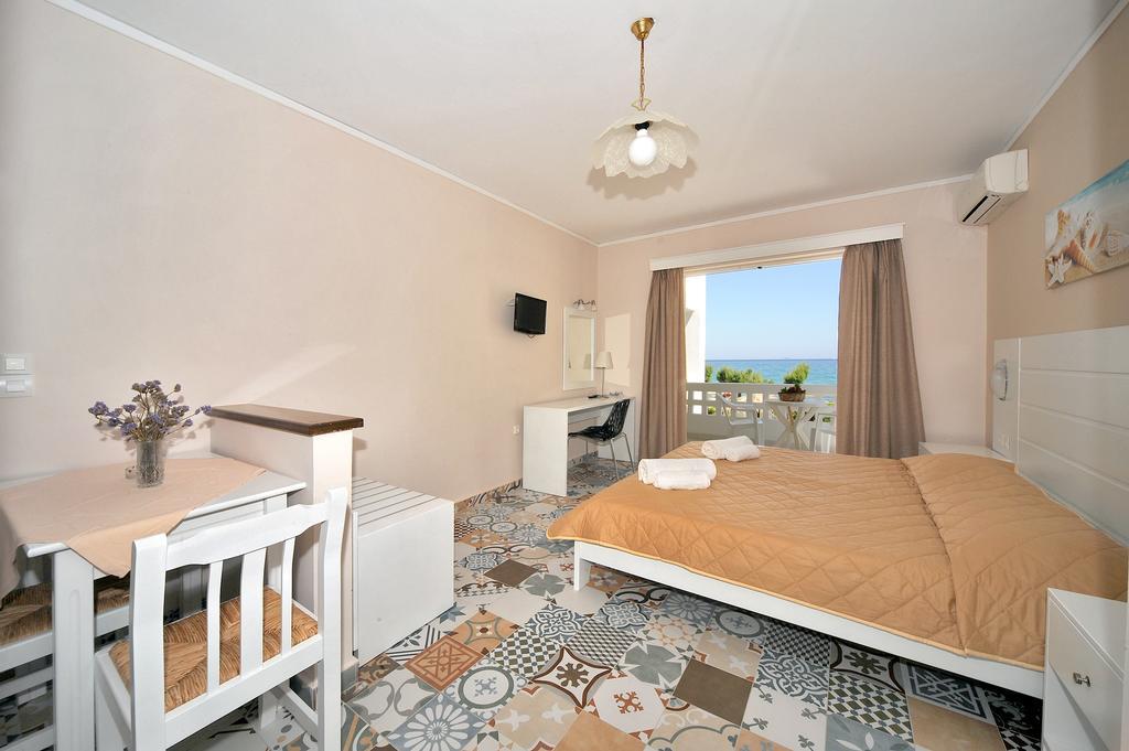 Byron Apartments Тигаки Номер фото